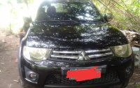 Selling Black Mitsubishi Strada 2010 in Manila
