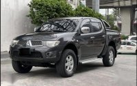 Black Mitsubishi Strada 2012 for sale in Jaen