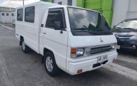Selling White Mitsubishi L300 2014 in Quezon