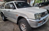 Silver Mitsubishi Strada 2000 for sale in Quezon