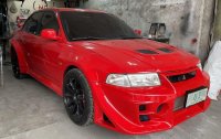 Selling Red Mitsubishi Lancer Evolution 1999 in Valenzuela