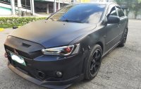 Black Mitsubishi Lancer 2010 for sale in Automatic