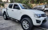 Selling White Mitsubishi Strada 2011 in Quezon City