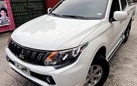 Selling White Mitsubishi Strada 2018 in Quezon 
