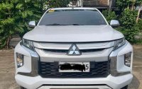 Selling White Mitsubishi Strada 2020 in Quezon City