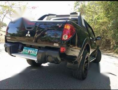 2012 Mitsubishi Strada GLXV ACCUIRED 2013