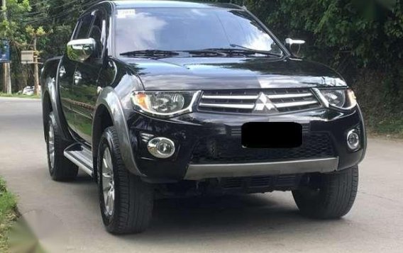 2012 Mitsubishi Strada GLSV top of the line 4x4 1st own cebu plate