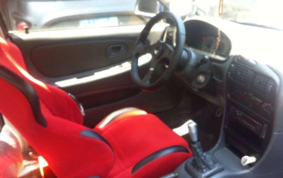 Mitsubishi Lancer color blue glxi all power. 1996 model