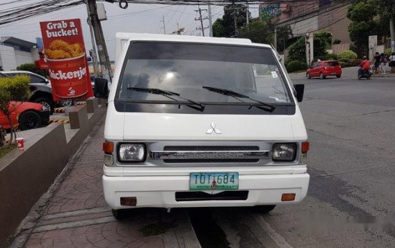 Selling White Mitsubishi L300 2012 at 70000 km in Quezon City