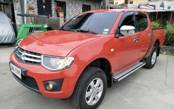 Selling Red Mitsubishi Strada 2014 at 49000 km in Quezon City