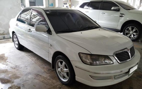 Selling 2nd Hand Mitsubishi Lancer 2004 Automatic Gasoline at 149000 km in Quezon City