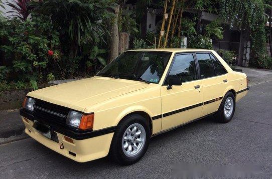 Selling Yellow Mitsubishi Lancer 1987 at 6000 km
