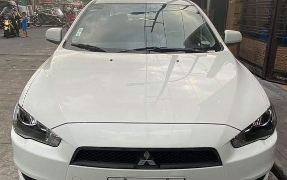 Sell White 2014 Mitsubishi Lancer in Manila