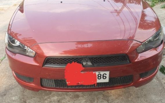 Red Mitsubishi Lancer for sale in Manila