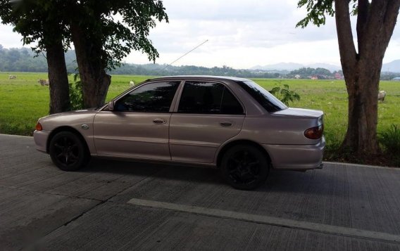 Selling Beige Mitsubishi Lancer for sale in Rizal