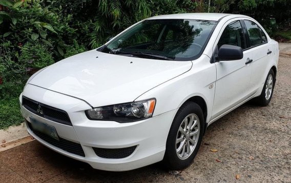 Selling White Mitsubishi Lancer ex in Taguig