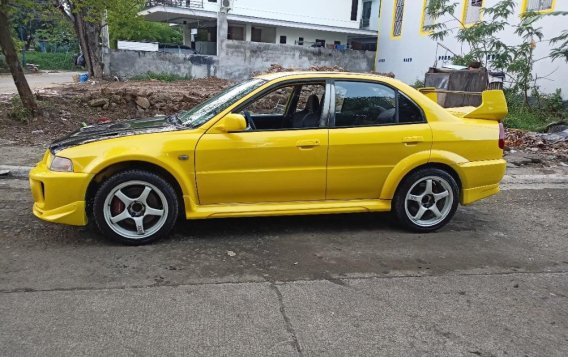 Selling Yellow Mitsubishi Lancer Evolution 1998 in Pasig