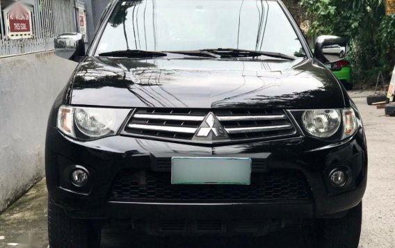 Black Mitsubishi Strada 2012 for sale in Quezon