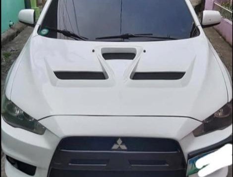 Pearl White Mitsubishi Lancer 2010 for sale in Quezon City
