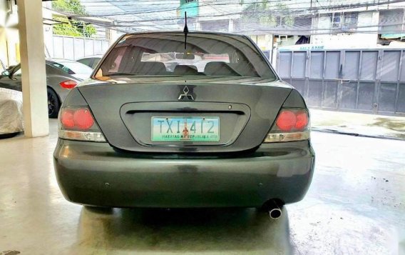 Selling Greyblack Mitsubishi Lancer 2011 in Quezon City