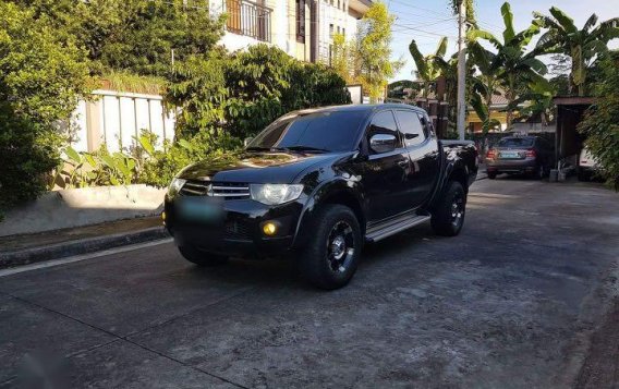 Selling Black Mitsubishi Strada 2012 in Marikina